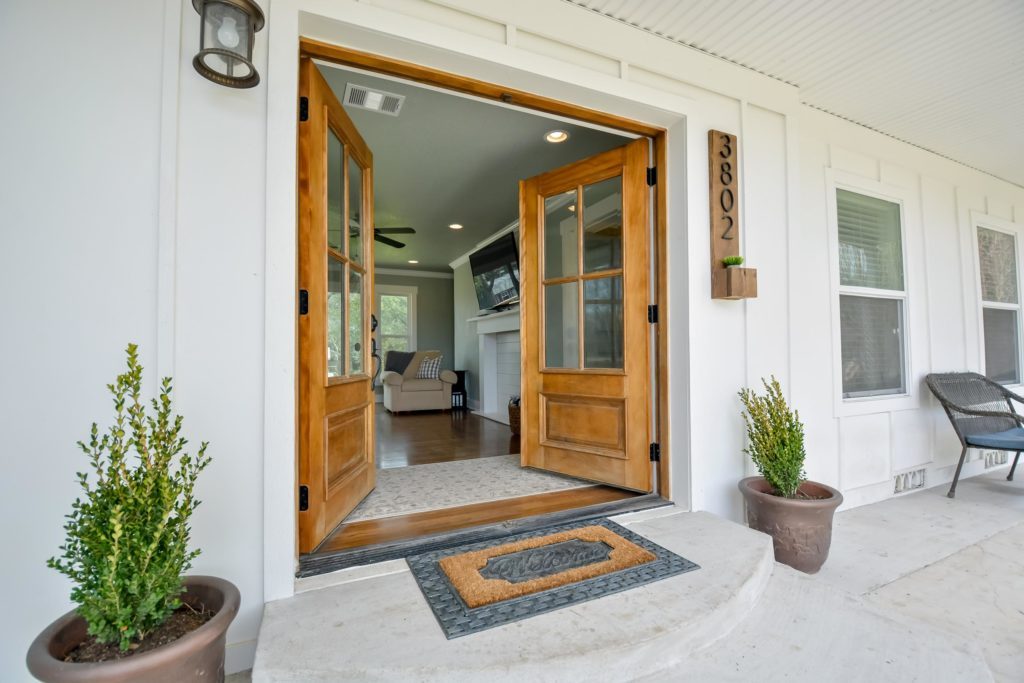 French Front Doors of a home sold by two lakes group central Texas Real Estate